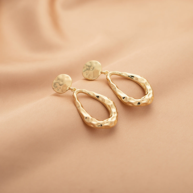 Hollow Waterdrop Pendant Gold Earrings Fashionable Style